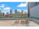 Rooftop terrace with comfortable seating offering panoramic city skyline views at 111 N 12Th St # 1305, Tampa, FL 33602
