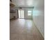 Bright enclosed balcony with tile flooring and views at 11447 Park Blvd # 301, Seminole, FL 33772