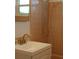 Bathroom showcasing a sink, vanity, and pink-tiled shower at 11447 Park Blvd # 301, Seminole, FL 33772
