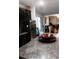 Modern kitchen with granite countertops and stainless steel appliances, seamlessly connected to the living area at 11704 Navajo Sandstone St, Riverview, FL 33579