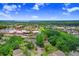 Aerial view showcases the property's location near waterfront and commercial area at 134 Sycamore Ln # F, Oldsmar, FL 34677