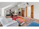 Versatile bonus room with sloped ceilings, perfect for a home office, featuring ample space and natural light at 13801 Lake Village Pl, Tampa, FL 33618