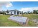 Backyard featuring a swing, and a view of the pool and play area at 14902 Sweat Loop Rd, Wimauma, FL 33598