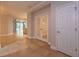 Welcoming entryway featuring neutral tones, tile flooring, and direct access to various living spaces at 16226 Bayberry View Dr, Lithia, FL 33547