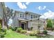 Beautiful two-story home boasts manicured landscaping and a charming stone-accented entryway, creating an inviting curb appeal at 16226 Bayberry View Dr, Lithia, FL 33547