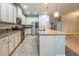 Stylish kitchen featuring stainless steel appliances, granite countertops, and a large center island at 16226 Bayberry View Dr, Lithia, FL 33547