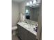 Elegant bathroom with a marble countertop and modern fixtures at 192 Tulane Rd, Venice, FL 34293