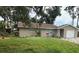 Cozy one-story home with a brown roof, complemented by a well-manicured front yard at 192 Tulane Rd, Venice, FL 34293