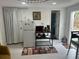 Efficient kitchenette with a compact refrigerator and space-saving design at 192 Tulane Rd, Venice, FL 34293