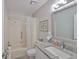 Bathroom with a tub and shower combination, and a granite countertop at 2115 N Halcyon Dr # 510, Sun City Center, FL 33573
