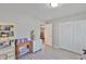 Bedroom with closet and light-grey flooring at 2115 N Halcyon Dr # 510, Sun City Center, FL 33573