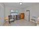 Bedroom with a rocking chair and plenty of storage at 2115 N Halcyon Dr # 510, Sun City Center, FL 33573
