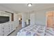 Neutral bedroom with hardwood floors and connected bath offers ample space and natural light at 2115 N Halcyon Dr # 510, Sun City Center, FL 33573