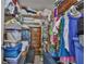 Walk-in closet providing ample storage with shelving and hanging space for organized living at 2115 N Halcyon Dr # 510, Sun City Center, FL 33573