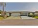 Charming single story home with a well-manicured lawn and two-car garage at 2115 N Halcyon Dr # 510, Sun City Center, FL 33573