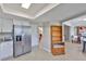 Modern kitchen with stainless steel appliances and ample cabinet space, flowing into dining area at 2115 N Halcyon Dr # 510, Sun City Center, FL 33573