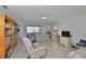 Spacious living room features wood floors, comfortable seating, and ample natural light at 2115 N Halcyon Dr # 510, Sun City Center, FL 33573