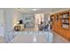 Cozy living room with wood floors, comfortable sofas, and a decorative cabinet offering ample space at 2115 N Halcyon Dr # 510, Sun City Center, FL 33573