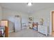 Bright office with wood floors, white shelving and a neutral color scheme offers a dedicated workspace at 2115 N Halcyon Dr # 510, Sun City Center, FL 33573