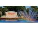 Entrance to Sun City Center with cascading fountains adding a colorful touch to the view at 2115 N Halcyon Dr # 510, Sun City Center, FL 33573