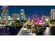 Vibrant city skyline at night, showcasing illuminated buildings, waterfront views, and a modern pier at 260 Sw Lincoln N Cir, St Petersburg, FL 33703