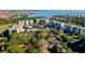 Spacious layout of the property showing buildings, parking, pool, and green spaces, offering a complete community view at 2614 Cove Cay Dr # 409, Clearwater, FL 33760
