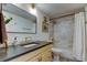 Beautifully renovated bathroom with new vanity, matte black hardware, and modern white subway tile at 2614 Cove Cay Dr # 409, Clearwater, FL 33760