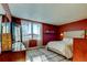 Stylish bedroom with a large window, accent wall, and sophisticated decor that create a cozy atmosphere at 2614 Cove Cay Dr # 409, Clearwater, FL 33760