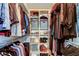 Walk-in closet with shelving and ample storage for clothes, shoes, and accessories at 2614 Cove Cay Dr # 409, Clearwater, FL 33760