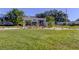 Attractive community entry with a fountain, well-maintained landscaping, and a manicured lawn at 2614 Cove Cay Dr # 409, Clearwater, FL 33760