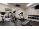 Community gym featuring free weights, machines, and mirrors at 2614 Cove Cay Dr # 409, Clearwater, FL 33760
