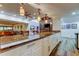 A grand kitchen featuring granite countertops and a large island, perfect for parties at 2614 Cove Cay Dr # 409, Clearwater, FL 33760