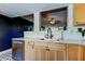 Bright kitchen area with stainless steel appliances and a window with an outside view at 2614 Cove Cay Dr # 409, Clearwater, FL 33760
