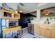Well-lit kitchen featuring stainless steel appliances and black and white flooring at 2614 Cove Cay Dr # 409, Clearwater, FL 33760