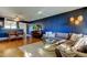 Spacious living room area with views out to the dining room and piano at 2614 Cove Cay Dr # 409, Clearwater, FL 33760