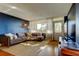 Comfortable living room with ample natural light and a cozy seating arrangement at 2614 Cove Cay Dr # 409, Clearwater, FL 33760