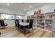 Professional meeting room with a conference table, chairs, and a bookshelf, ideal for collaborations at 2614 Cove Cay Dr # 409, Clearwater, FL 33760