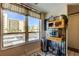 Window view featuring an outside building, parking area and a sunny sky at 2614 Cove Cay Dr # 409, Clearwater, FL 33760