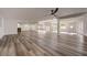 Large finished basement with new flooring, recessed lighting, and multiple windows for ample natural light at 2679 Haines Bayshore Rd, Clearwater, FL 33760