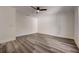 Spacious bedroom featuring sleek flooring and neutral decor at 2679 Haines Bayshore Rd, Clearwater, FL 33760