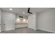 Bonus room with storage and a ceiling fan at 2679 Haines Bayshore Rd, Clearwater, FL 33760