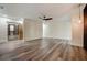 Spacious living room featuring stylish flooring and a modern ceiling fan at 2679 Haines Bayshore Rd, Clearwater, FL 33760