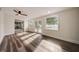 Spacious living room with hardwood floors and backyard access at 2679 Haines Bayshore Rd, Clearwater, FL 33760