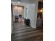 This office features modern flooring, an adjacent bedroom area, and custom wall features at 2679 Haines Bayshore Rd, Clearwater, FL 33760