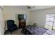 Bedroom featuring neutral walls, ceiling fan, and plenty of natural light at 2797 Cordova S Way, St Petersburg, FL 33713