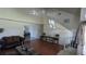 Inviting living room boasting hardwood floors, neutral walls, and stairs to the second floor at 2797 Cordova S Way, St Petersburg, FL 33713
