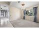 Bright dining room with carpeted floors, chandelier and lots of natural light at 3066 Landmark Blvd # 1305, Palm Harbor, FL 34684