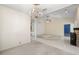 Bright dining room with a chandelier, carpeted floors, and abundant natural light at 3066 Landmark Blvd # 1305, Palm Harbor, FL 34684