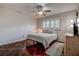 Bedroom with a ceiling fan, hardwood floor, and a window with blinds at 3122 37Th S Ln # C, St Petersburg, FL 33711
