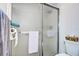 Bathroom with a glass enclosed shower featuring a chrome towel bar at 3122 37Th S Ln # C, St Petersburg, FL 33711